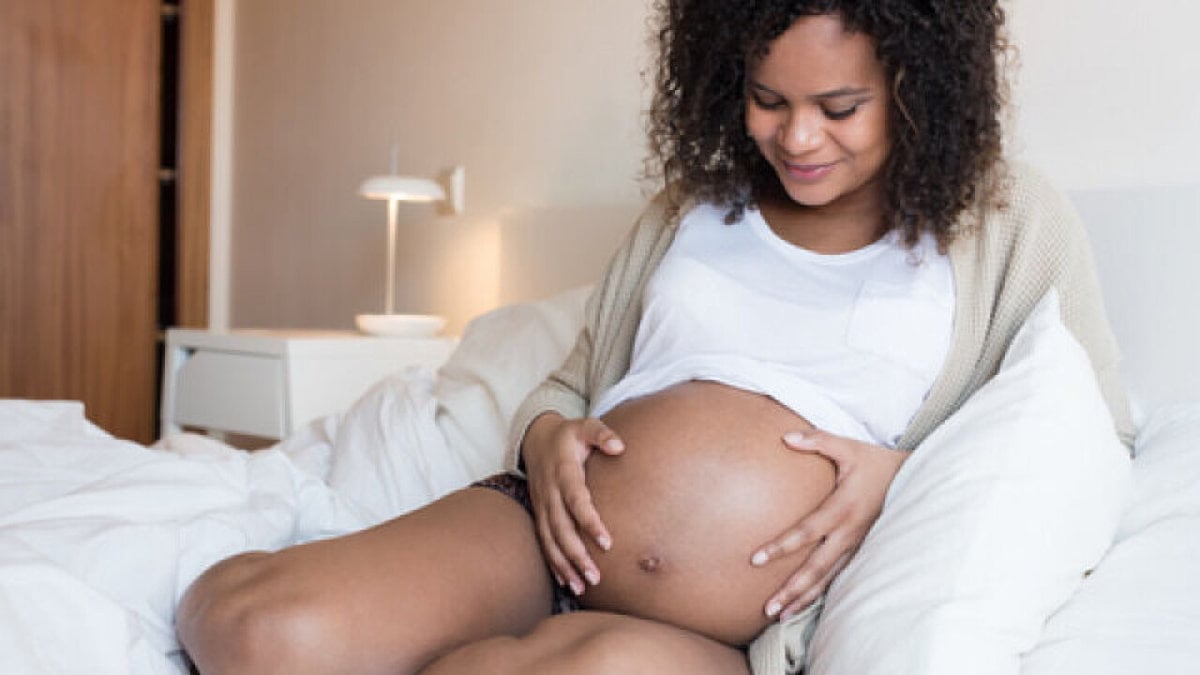 Kvinna gravid i vecka 38